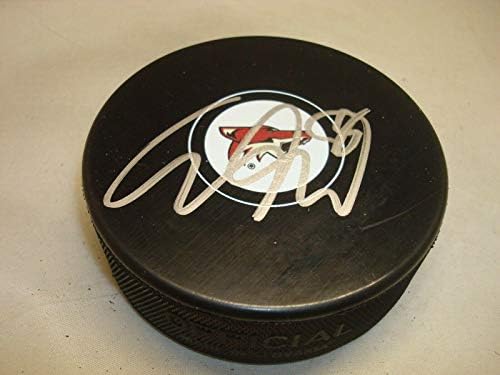 Christian Dvorak assinou o Arizona Coyotes Hockey Puck autografado 1C - Pucks autografados da NHL