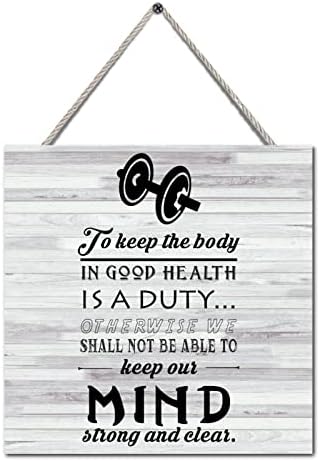 Placa impressa de madeira com dizer para manter o corpo em boa saúde é um imposto de imposto de madeira para encorajar presentes