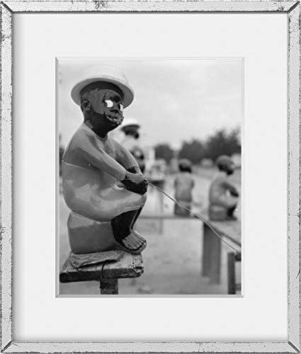 Fotografias infinitas 1951 Foto: estátua de madeira pintada, homem afro -americano | Polo de pesca | Estereótipos étnicos | Foto vintage