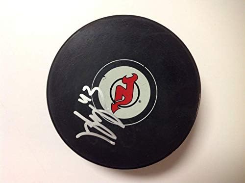 Brett Seney assinou autografado NJ New Jersey Devils Hockey Puck A - Pucks NHL autografados