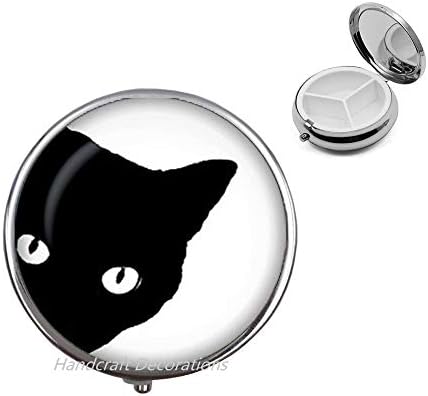 Caixa de pílula de vidro de gato preto.